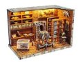 : Miniatura domečku Dinosauří výzkumný ústav